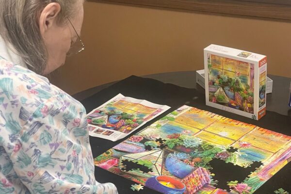 Westgate Resident Working On A Puzzle